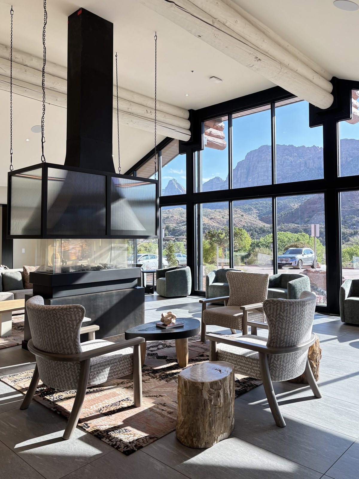 Hilton lounge with fireplace and mountain views